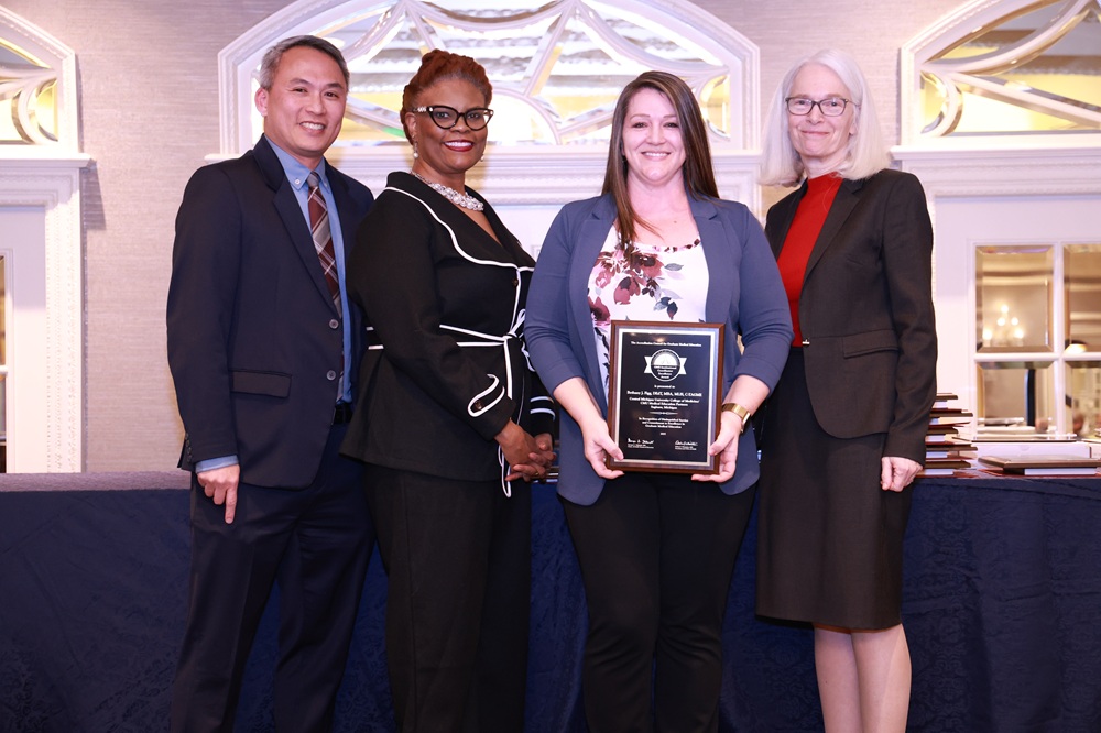 Bethany J. Figg, DEdT, MBA, MLIS, C-TAGME